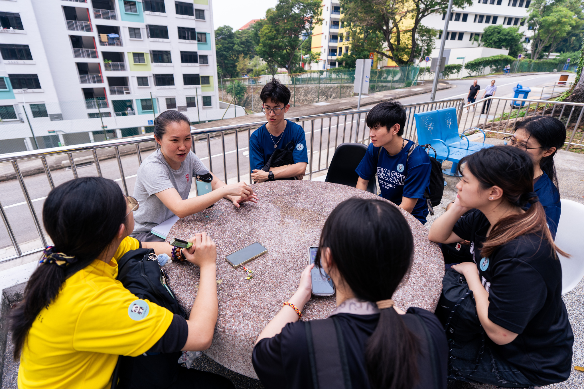 Student delegates explore the Jalan Kukoh neighbourhood as part of a community learning journey at Polytechnic Forum 2026.